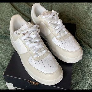 Never worn light bone wmns af1s size 10.5